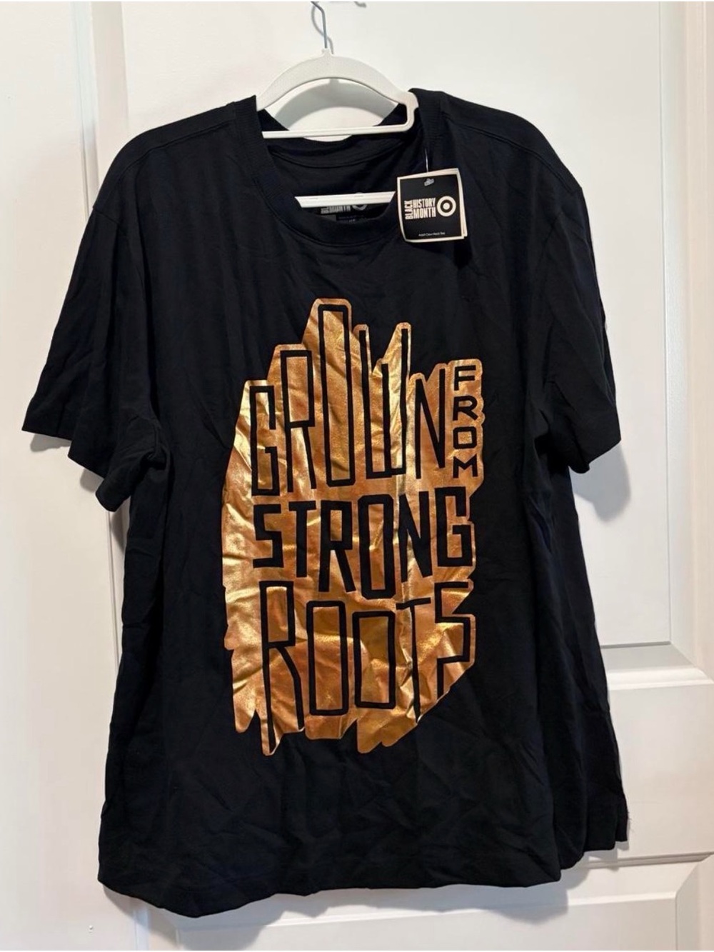 Target Black Tee with Gold Foil 'Grown From Strong Roots' Graphic